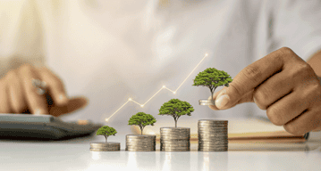 A man saving up money after learning the fundamentals of business administration & management course.